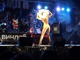 sexy russian woman striptease to bare at concert stage