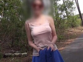 Big tits brunette showing off her long legs as well