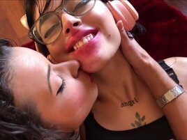 Lipstick fetish and extensive kissing from two ladies