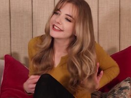 Gabie is stretching her pussy with a big yellow dildo