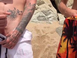 Two men with big cocks are fucking a busty MILF