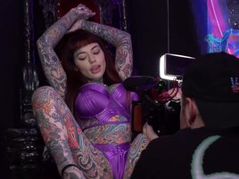 Redhead with tons of tattoos is ready to ride